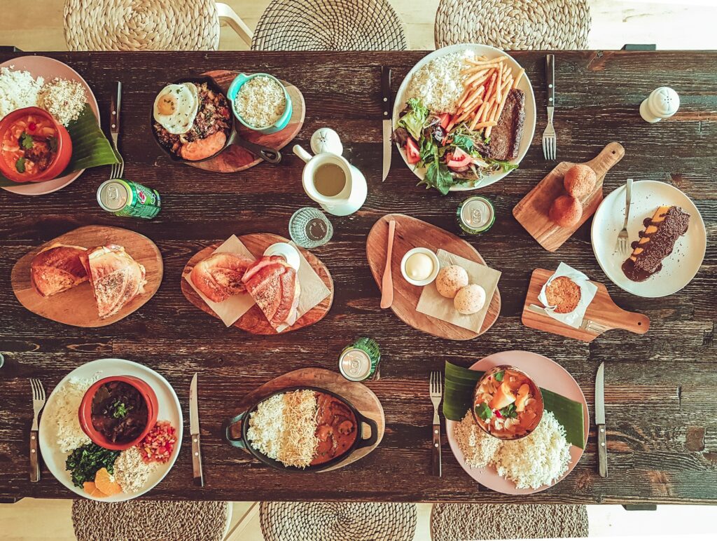 Brazilian lunch feast on wooden kitchen table